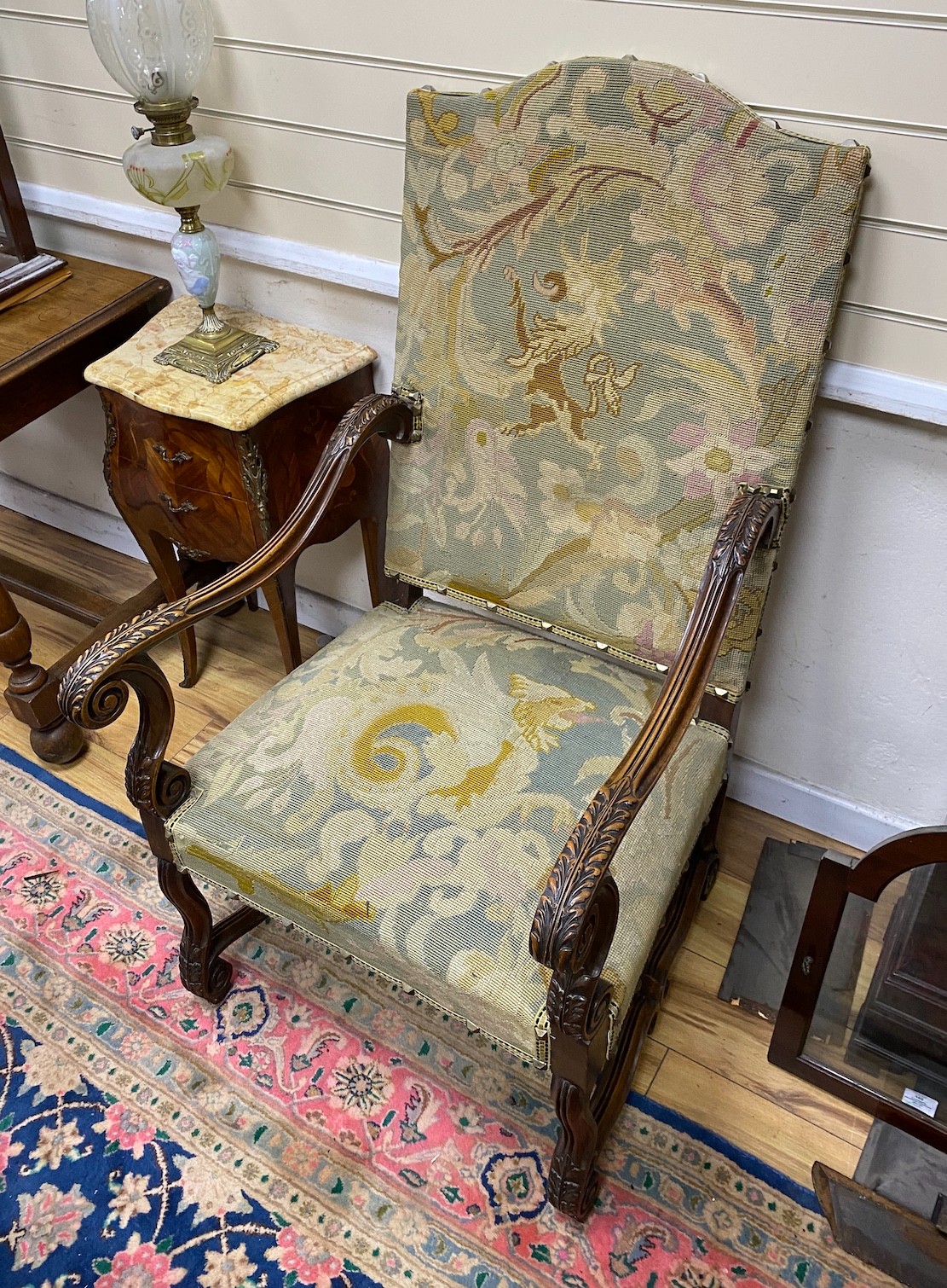 A pair of Louis XIII style walnut tapestry open armchairs, width 65cm, depth 62cm, height 116cm